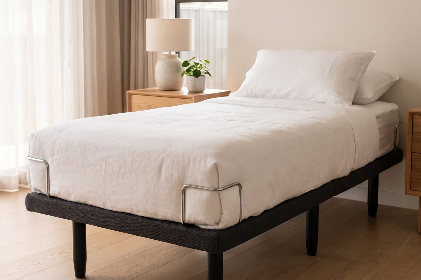Sophie electric adjustable bed made up in a styled bedroom