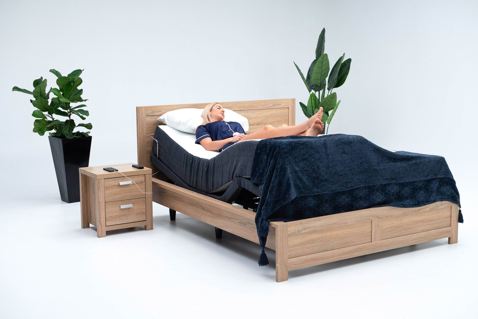 Sophie electric adjustable bed made up in a styled Canberra bedroom