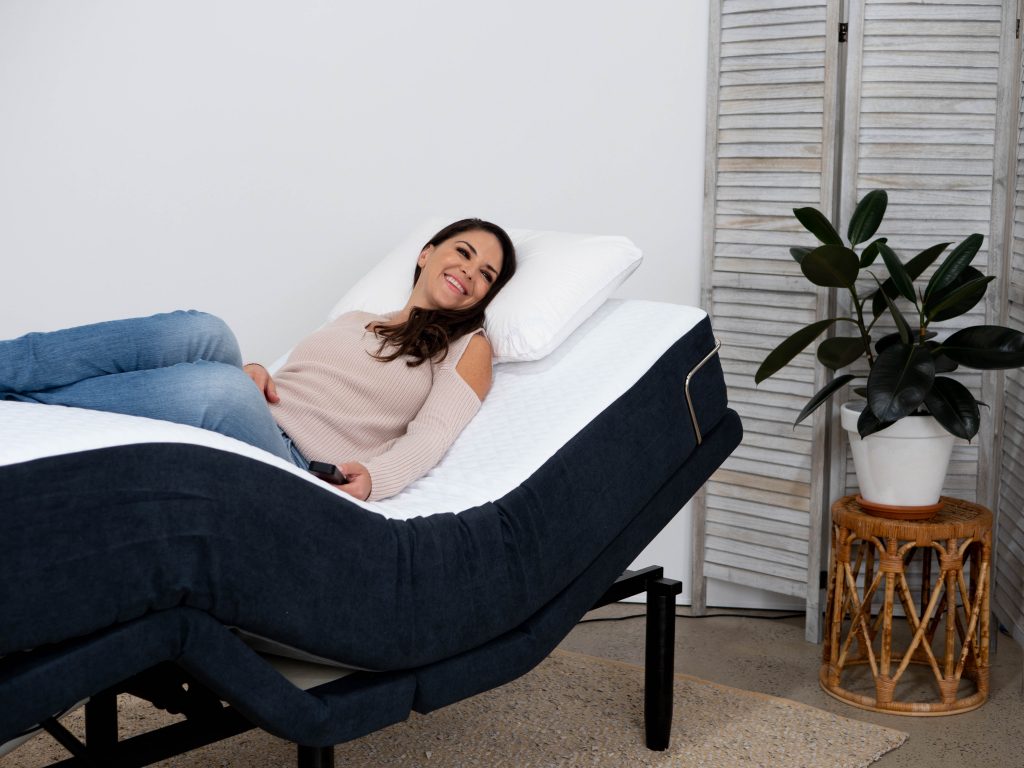 lady in single bed in adjusted position