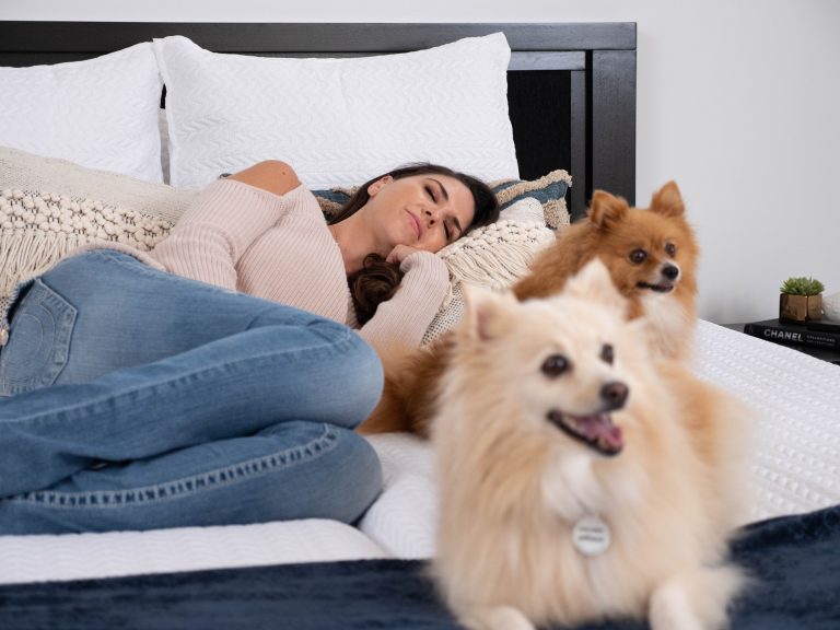 lady and her dogs on a Sophie adjustable bed