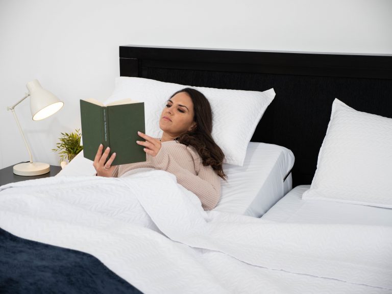 Lady reading in adjustable bed
